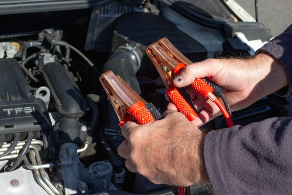 person-holding-red-and-black-hand-tool-pnhzg9ckss4